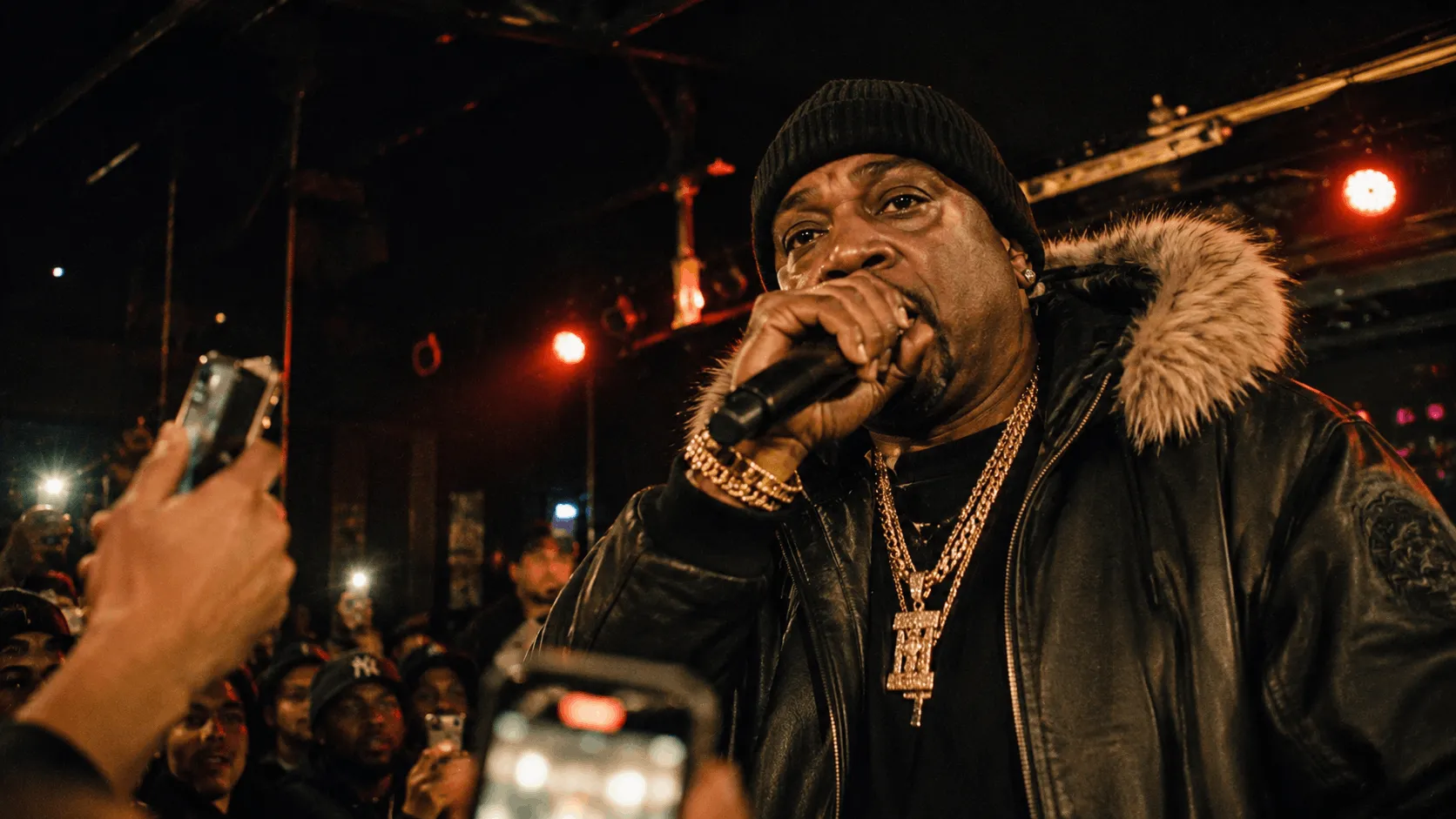 Jim Jones performing live, a key factor behind his reported net worth